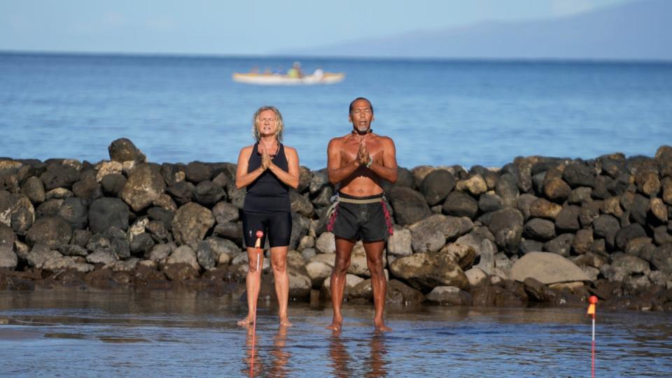 Vicente, right, and Ewa Ruboi perform a blessing to greet the day on the beach Tuesday, 15 Aug 2023, in Kihei, Hawaii (Copyright 2023 The Associated Press. All rights reserved)