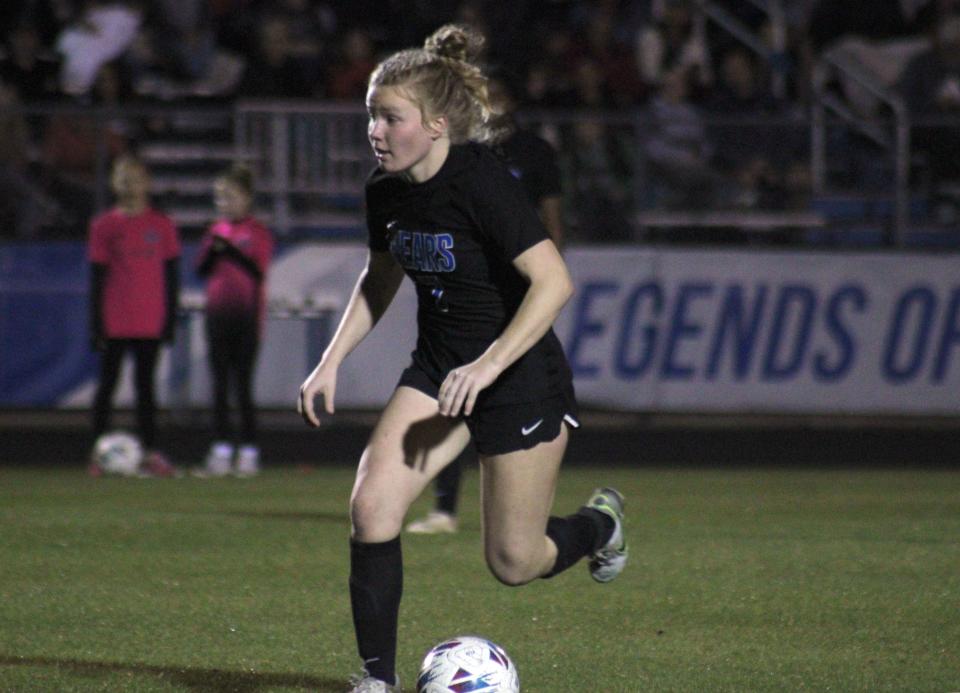 Bartram Trail midfielder Carolyn Johnson (7) dribbles upfield in the FHSAA playoffs.