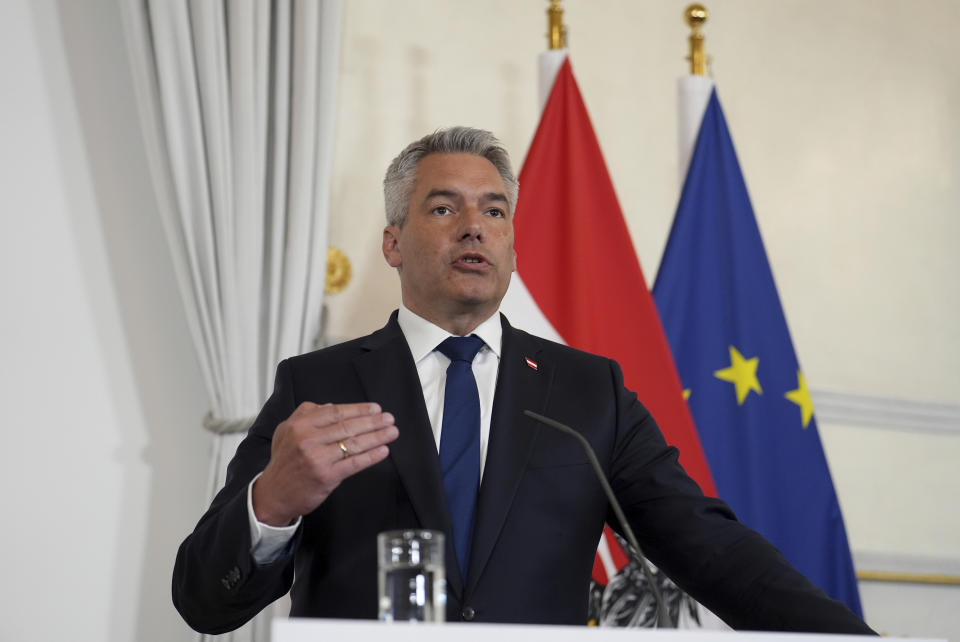 The Chancellor of Austria, Karl Nehammer speaks at a joint press conference with Prime Minister Rishi Sunak, at Federal Chancellery Ballhausplatz in Vienna, during a visit to Austria, Tuesday May 21, 2024. (Jordan Pettitt/pool photo via AP)