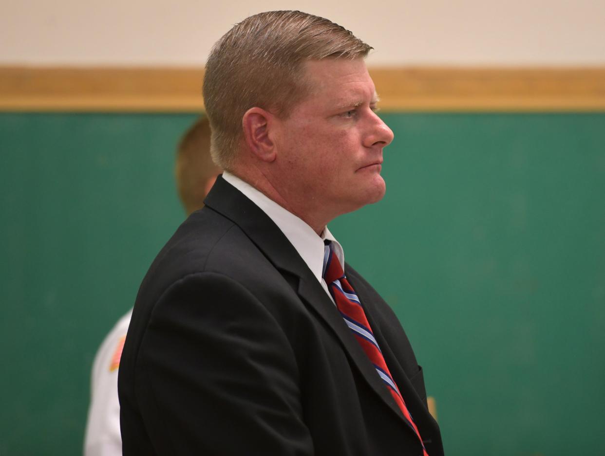 SPENCER - Trooper Todd Girouard during his court arraigment Monday morning.