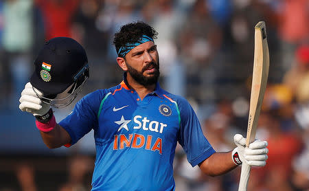 Cricket - India v England - Second One Day International - Barabati Stadium, Cuttack, India - 19/01/17. India's Yuvraj Singh celebrates after scoring a century. REUTERS/Adnan Abidi