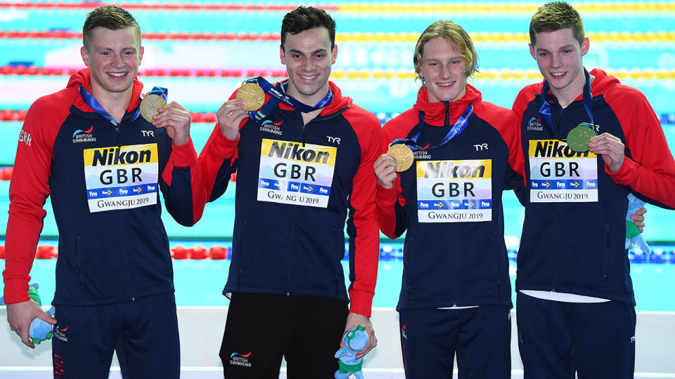 Gold medalists Luke Greenbank, Adam Peaty, James Guy and Duncan Scott after the 4x100m medley relay. (Photo by Quinn Rooney/Getty Images)