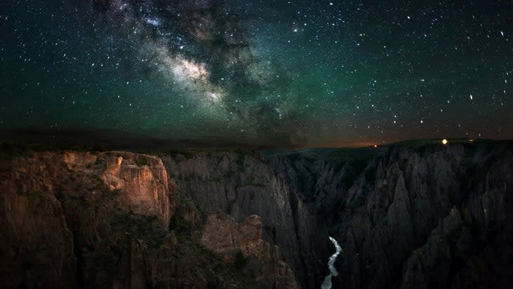 <span class="article__caption">Night sky over the steep and deep gorge of the Black Canyon of the Gunnison, Colorado </span> (Photo: G. Owens/NPS)
