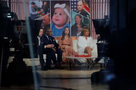 Co-hosts Hoda Kotb (R) and Savannah Guthrie sit with Al Roker on NBC's Today Show in New York, U.S., January 3, 2018. REUTERS/Lucas Jackson