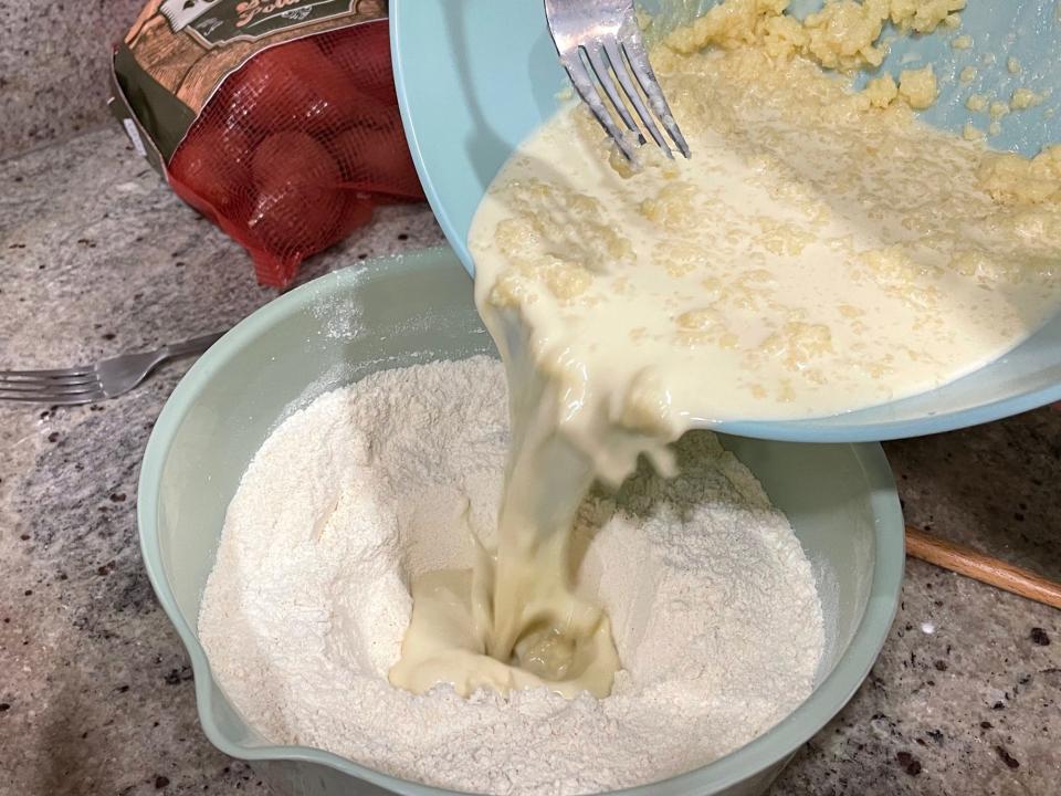 Adding wet ingredients to batter for Ina Garten cornbread