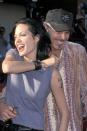 <p>Giggling with then-husband Billy Bob Thornton at the <em>Gone in 60 Seconds</em> premiere in June 2000.</p>