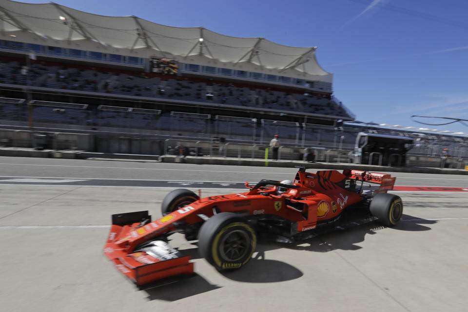 Ferrari driver Sebastian Vettel, of Germany, pulls into the pits during first practice session for the Formula One U.S. Grand Prix auto race at the Circuit of the Americas, Friday, Nov. 1, 2019, in Austin, Texas. (AP Photo/Darron Cummings)