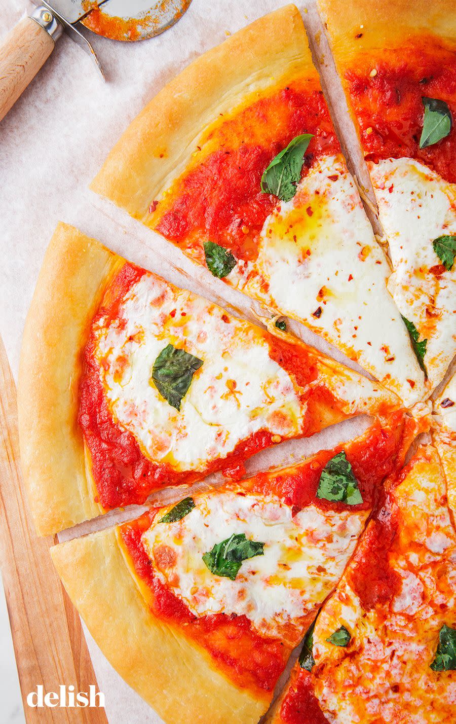 <p>We know, pizza is an easy choice when debating what to order for your night in, but what better way to spend your evening than a homemade pizza party? Get all your pals together to make your own homemade pizzas—knead the dough, sauce it up, and add all your own favorite toppings!</p><p>Get the <strong><a href="https://www.delish.com/cooking/recipe-ideas/a24893663/homemade-pizza-recipe/" rel="nofollow noopener" target="_blank" data-ylk="slk:Homemade Pizza recipe;elm:context_link;itc:0;sec:content-canvas" class="link ">Homemade Pizza recipe</a></strong>. </p>