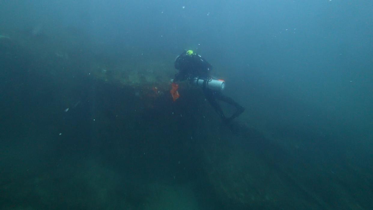 Diver Joe Citelli inspecting the wreck of the SS Cotopaxi. (Photo: Science Channel)