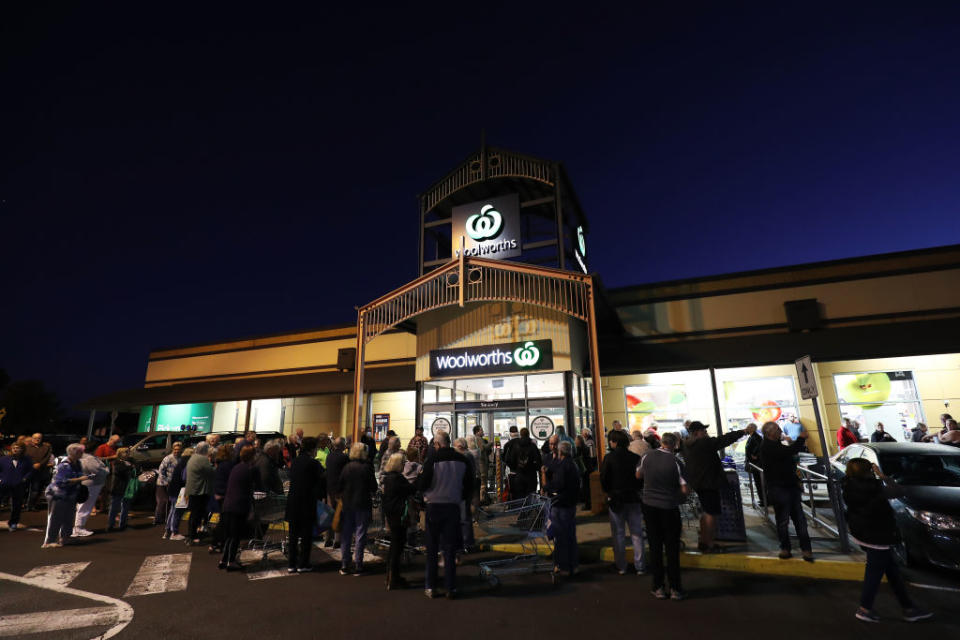 General view outside a Woolworths in Sunbury as people wait outside in Australia. 