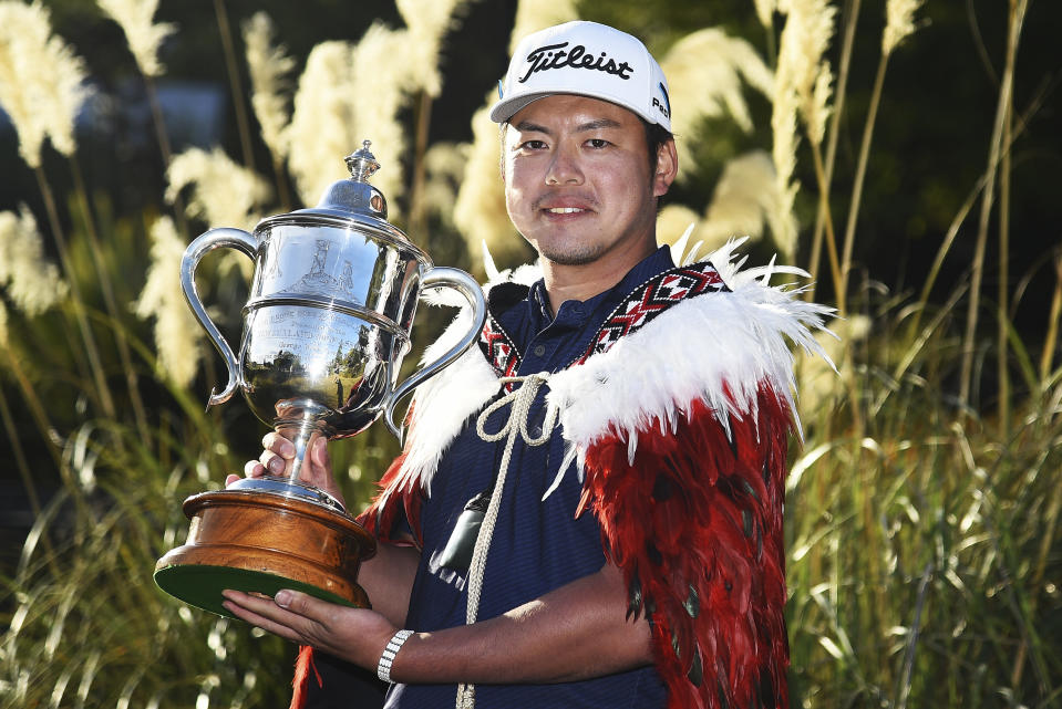 Japan's Takahiro Hataji holds his trophy after winning the New Zealand Golf Open at the Millbrook Resort, in Arrowtown, New Zealand, Sunday, March 3, 2024. (Evan Barnes/Photosport via AP)