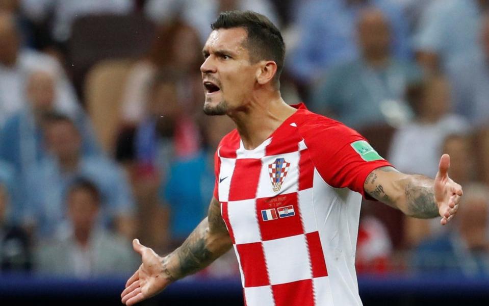 Second prize: Croatia's Dejan Lovren didn't think much to the France side's approach - REUTERS