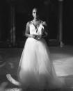 <p>For the evening reception, Rae changed into another custom Vera Wang design, this time featuring spaghetti straps, a plunging crepe top and layered tulle skirt. </p><p>Vera Wang has been busy of late designing wedding dresses for celebrity clientele. Just two months ago, <a href="https://www.elle.com/uk/life-and-culture/culture/a33007446/vera-wang-ageing-fans-shock/" rel="nofollow noopener" target="_blank" data-ylk="slk:the 71-year-old designer;elm:context_link;itc:0;sec:content-canvas" class="link ">the 71-year-old designer</a> also created<a href="https://www.elle.com/uk/life-and-culture/wedding/a36456759/ariana-grande-wedding-dalton-gomez/" rel="nofollow noopener" target="_blank" data-ylk="slk:Ariana Grande's wedding dress for her nuptials to Dalton Gomez.;elm:context_link;itc:0;sec:content-canvas" class="link "> Ariana Grande's wedding dress for her nuptials to Dalton Gomez.</a></p><p><a href="https://www.instagram.com/p/CRyvrYBAsEv/" rel="nofollow noopener" target="_blank" data-ylk="slk:See the original post on Instagram;elm:context_link;itc:0;sec:content-canvas" class="link ">See the original post on Instagram</a></p>