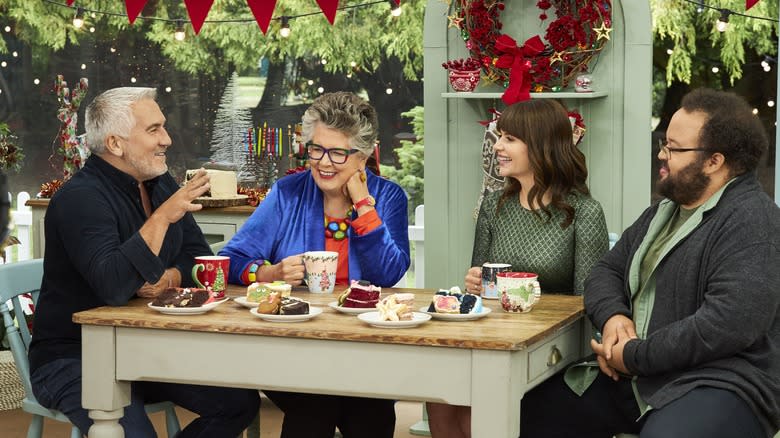 Prue Leith, Paul Hollywood, Casey Wilson, and Zach Cherry at table