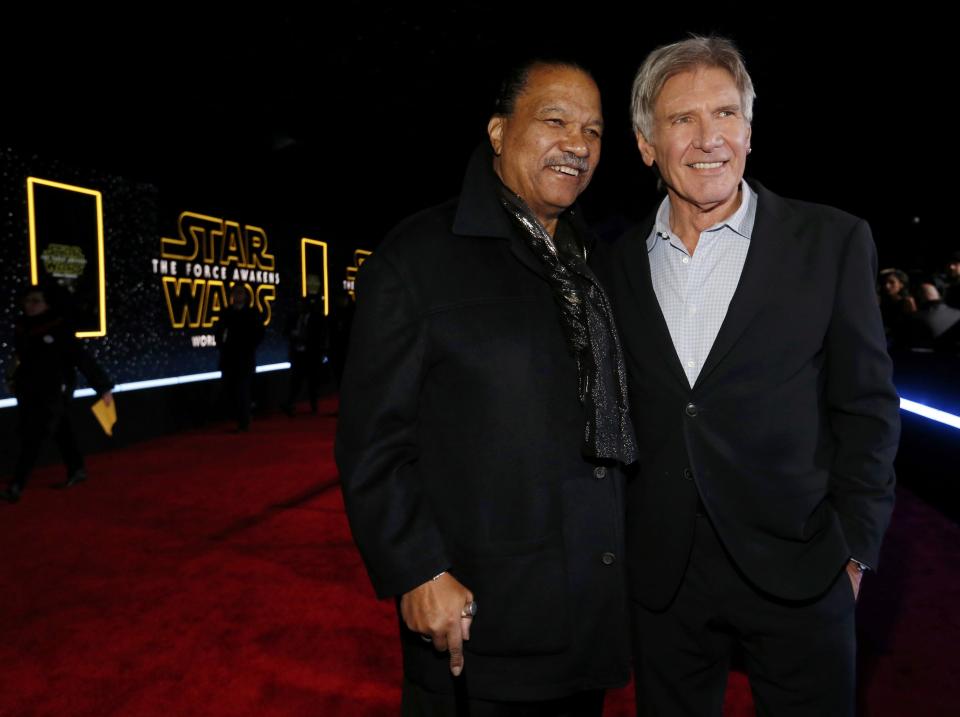 Actors Billy Dee Williams (L) and Harrison Ford arrive at the premiere of “Star Wars: The Force Awakens” in Hollywood, California December 14, 2015. REUTERS/Mario Anzuoni