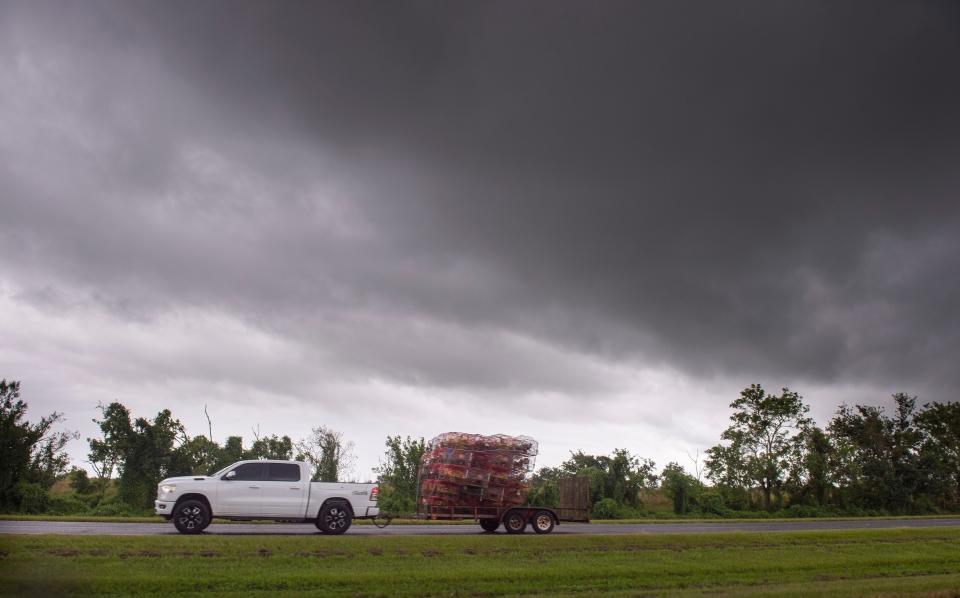 Boats and campers head out of the far eastern part of St. Bernard Parish as the Louisiana coast prepares for the arrival of Hurricane Ida on Friday, Aug. 27, in New Orleans.