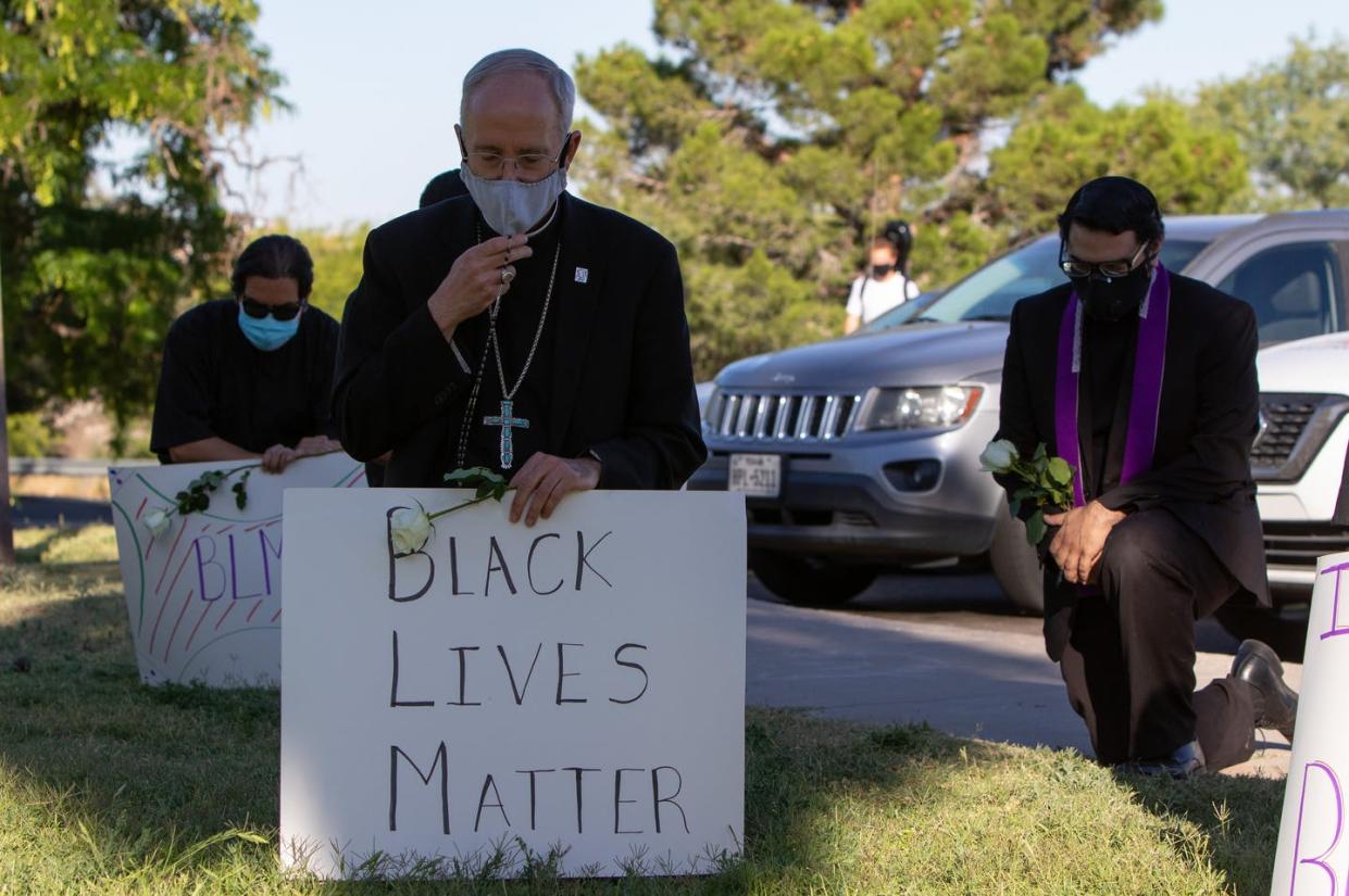 <span class="caption">Bishop Mark Seitz and priests from his diocese knelt for 8 minutes and 46 seconds to honor George Floyd, El Paso, June 1, 2020.</span> <span class="attribution"><span class="source">Courtesy of Corrie Boudreaux/El Paso Matters</span>, <a class="link " href="http://creativecommons.org/licenses/by-nd/4.0/" rel="nofollow noopener" target="_blank" data-ylk="slk:CC BY-ND;elm:context_link;itc:0;sec:content-canvas">CC BY-ND</a></span>