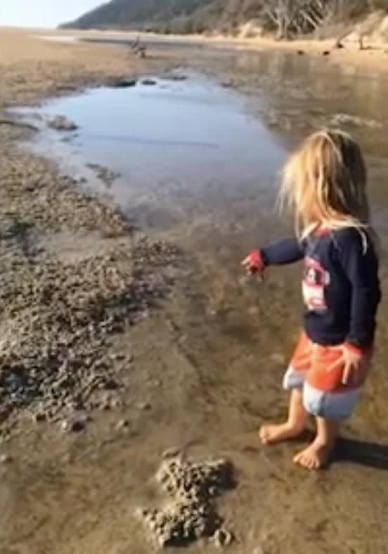 One of the twin boys was fascinated by the crabs on the beach. Source: Instagram