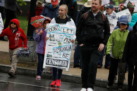 Demonstrators march to the U.S. Capitol during the March for Science in Washington, U.S., April 22, 2017. REUTERS/Aaron P. Bernstein