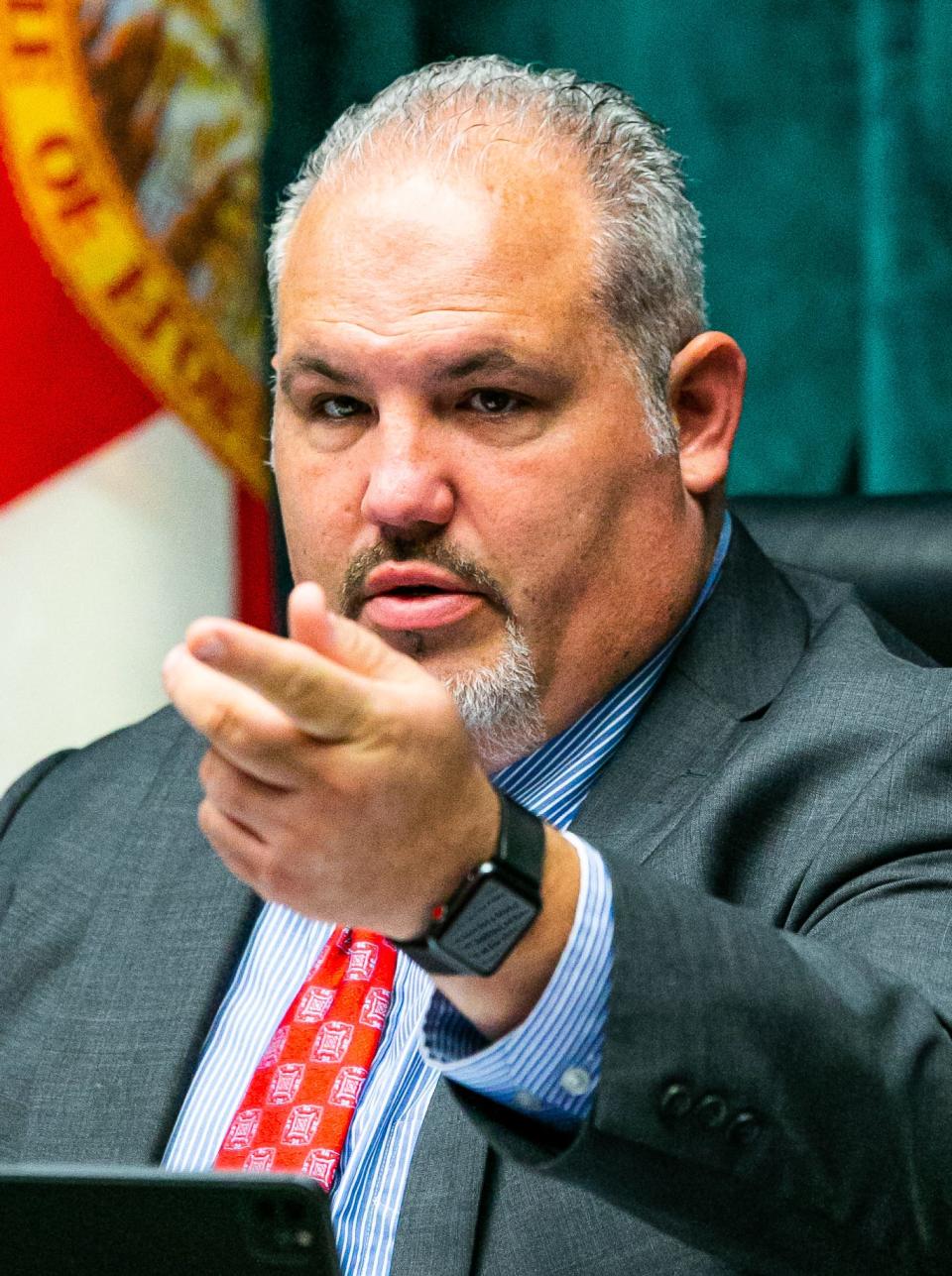 Marion County Commissioner Carl Zalak III, warned people to keep quiet as people spoke out against the Florida Turnpike extension last year.
