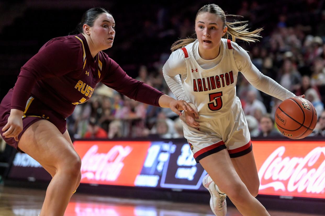 Arlington's Jaelyn Huntimer (5) drives to the basket around Ethan's Madeline Bartscher (34) in the semifinals of the state Class B girls basketball tournament on Friday, March 8, 2023 in the Summit Arena at The Momunment in Rapid City.