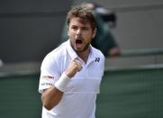 Stan Wawrinka of Switzerland celebrates after breaking serve during his match against Fernando Verdasco of Spain at the Wimbledon Tennis Championships in London, July 3, 2015. REUTERS/Toby Melville