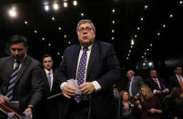 William Barr items papers during a break in testifying before a Senate Judiciary Committee hearing on his nomination to be attorney general of the United States on Capitol Hill in Washington, U.S., January 15, 2019. REUTERS/Jonathan Ernst