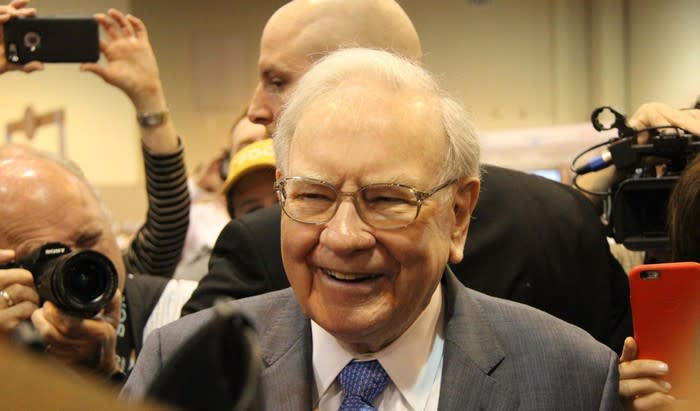 A picture of smiling Warren Buffett.