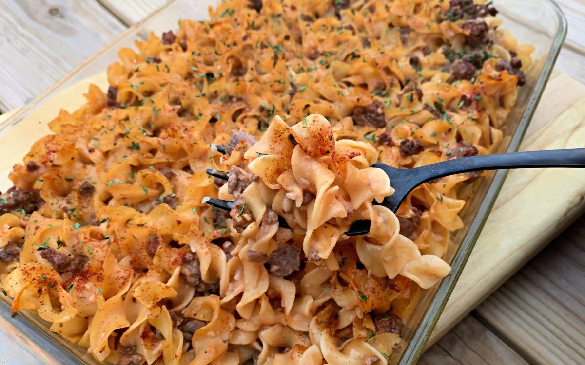 <p>Krista Marshall</p><p>Filled with egg noodles and <a href="https://parade.com/1018830/parade/ground-beef-recipes/" rel="nofollow noopener" target="_blank" data-ylk="slk:ground beef;elm:context_link;itc:0;sec:content-canvas" class="link rapid-noclick-resp">ground beef</a>, this crowd-feeding supper is not only delicious, but budget-friendly too! </p><p><strong>Get the recipe: <a href="/960338/kristamarshall/best-amish-casserole-recipe/" data-ylk="slk:Amish Casserole;elm:context_link;itc:0;sec:content-canvas" class="link rapid-noclick-resp">Amish Casserole</a></strong></p>