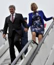 Canada's Prime Minister Stephen Harper and his wife Laureen arrive at Waterkloof Airforce Base in Pretoria December 9, 2013. Harper arrived to attend a memorial service for former South African President Nelson Mandela. South African anti-apartheid hero Mandela died aged 95 at his Johannesburg home on December 5 after a prolonged lung infection. REUTERS/Yolande Snyman/GCIS/Handout via Reuters (SOUTH AFRICA - Tags: POLITICS OBITUARY) ATTENTION EDITORS - THIS IMAGE HAS BEEN SUPPLIED BY A THIRD PARTY. IT IS DISTRIBUTED, EXACTLY AS RECEIVED BY REUTERS, AS A SERVICE TO CLIENTS. FOR EDITORIAL USE ONLY. NOT FOR SALE FOR MARKETING OR ADVERTISING CAMPAIGNS. NO SALES. NO ARCHIVES