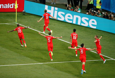 Soccer Football - World Cup - Group G - Tunisia vs England - Volgograd Arena, Volgograd, Russia - June 18, 2018 England's Harry Kane celebrates scoring their second goal with team mates REUTERS/Gleb Garanich