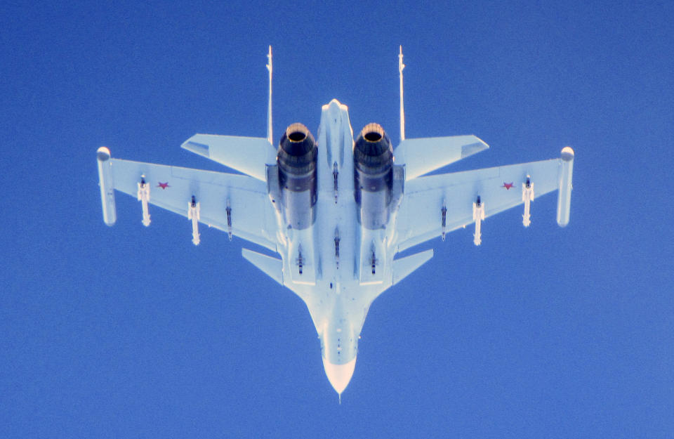 CAPTION CORRECTS AIRCRAFT NAME - In this photo taken on Saturday, June 15, 2019, a Russian Su-30 Flanker fighter flies over the Baltic Sea. Two Royal Air Force jets deployed in Estonia have been scrambled twice in recent days, bringing the number of intercepts of Russian aircraft to eight since taking over the Baltic Air Policing mission in early May. The Typhoon jets were alerted Friday to intercept a Russian Su-30 Flanker fighter, and passed a military transport craft as it was escorting the fighter over the Baltic Sea. In a second incident on Saturday, RAF crews intercepted a Su-30 Flanker fighter and an Ilyushin Il-76 Candid transport aircraft that was traveling north from the Russian enclave of Kaliningrad toward Estonian and Finnish airspace. (UK Ministry of Defence via AP)