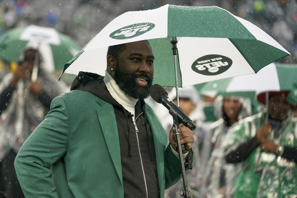 Former New York Jets player Derrelle Revis is honored on the field during the Hall of Honor ring ceremony during halftime of an NFL football game between the New York Jets and the Chicago Bears, Sunday, Nov. 27, 2022, in East Rutherford, N.J. (AP Photo/Seth Wenig)