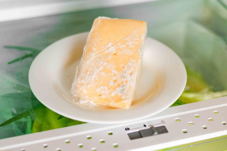 Should You Throw Away Moldy Cheese? Here’s What the Experts Say