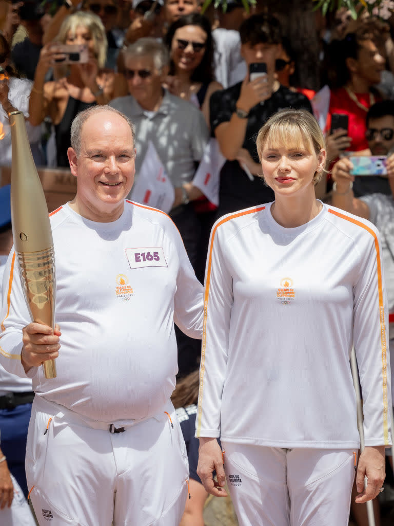 HSH Princess Charlene of Monaco and HSH Prince Albert II of Monaco attend the Olympic flame lighting 