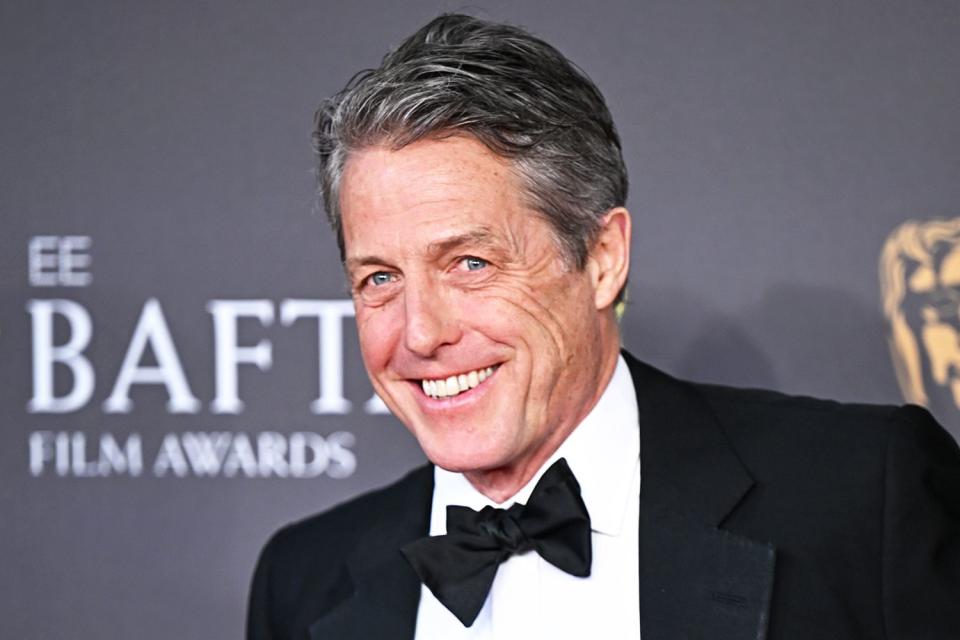 <p>Stephane Cardinale/Corbis/Getty</p> Hugh Grant on Feb. 18, 2024