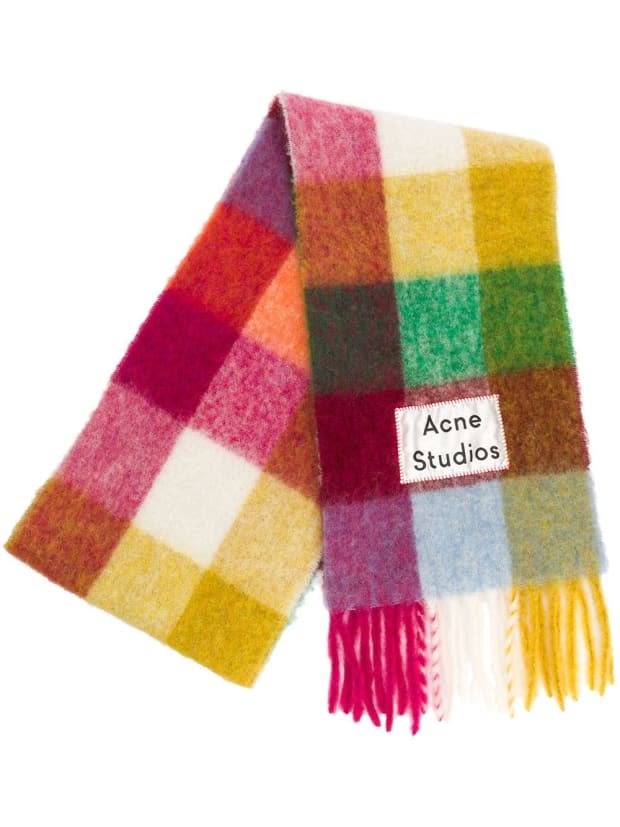 <p><strong>Acne Studios Grid Check Scarf, $280, <a href="https://rstyle.me/+b8BKkDQ1X2kTw2FxisWAWA" rel="nofollow noopener" target="_blank" data-ylk="slk:available here;elm:context_link;itc:0;sec:content-canvas" class="link ">available here</a>: </strong>"This wool-blend scarf adds a touch of color to my drab winter outfits and boasts an oversized fit, so it feels like I'm wearing a blanket at all times." —Dara Prant, Market Editor</p>