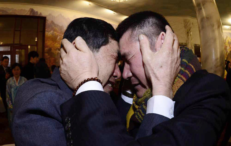 South Korean Park Yang-gon, left, and his North Korean brother Park Yang Soo get emotional as they met during the Separated Family Reunion Meeting at Diamond Mountain resort in North Korea, Thursday, Feb. 20, 2014. Elderly North and South Koreans separated for six decades are tearfully reuniting, grateful to embrace children, brothers, sisters and spouses they had thought they might never see again. (AP Photo/Korea Pool, Park Hae-soo)