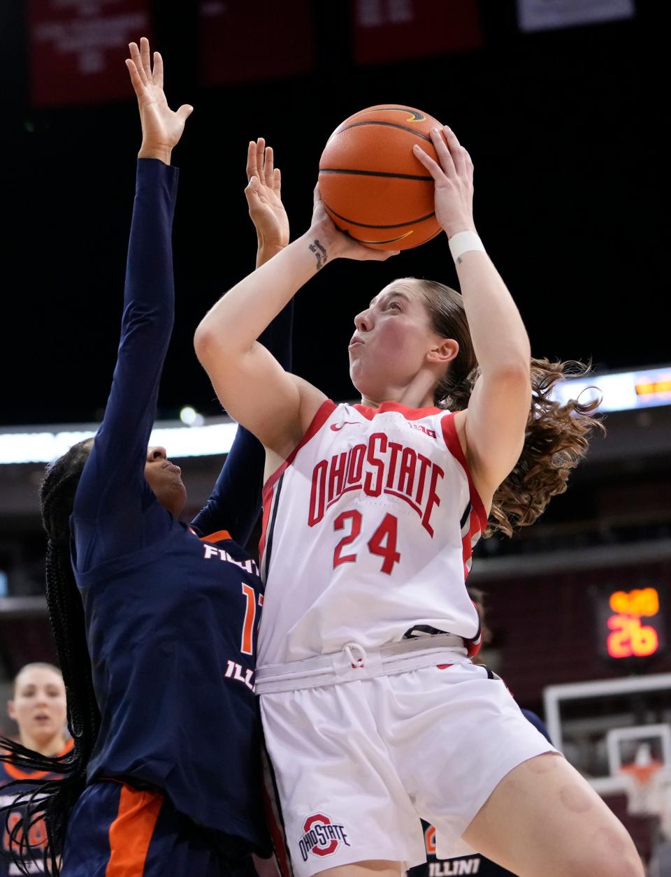 Ohio State guard Taylor Mikesell shoots over Illinois guard Jayla Oden during the fourth quarter at Value City Arena in Columbus on Jan. 6, 2022. Ohio State won 90-69.