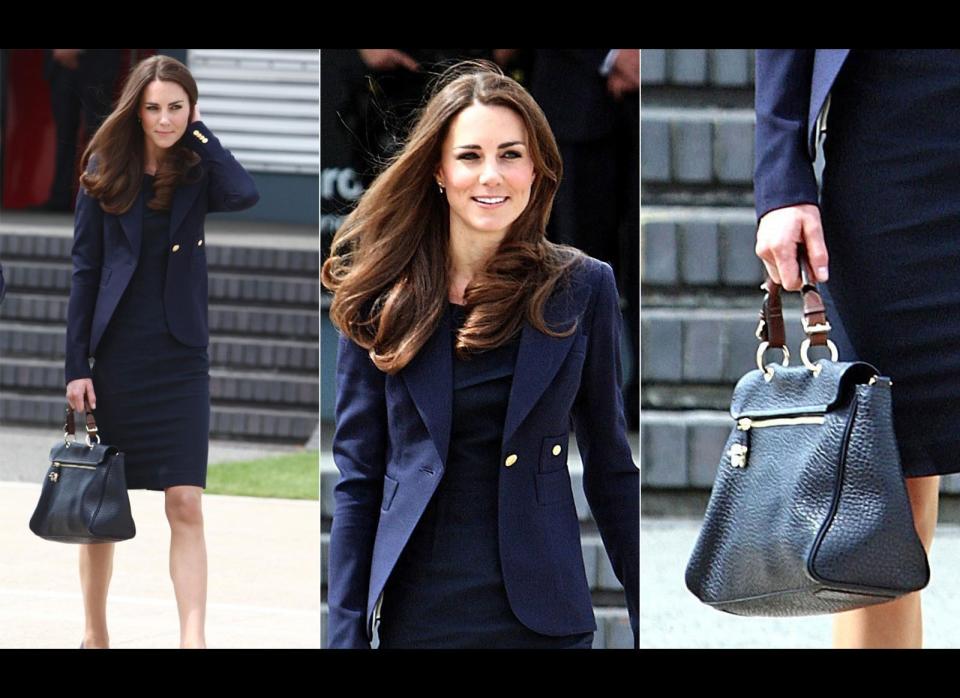 Jacket by Smythe, dress by Roland Mouret dress, pumps by Manolo Blahnik and leather bag by Mulberry. (Getty photos)