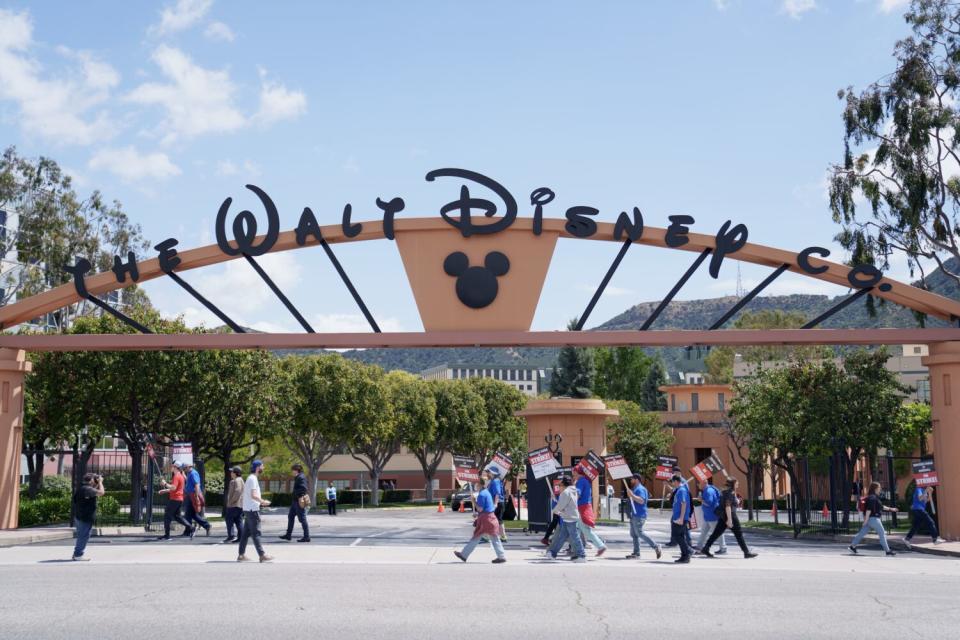 Workers picket at Disney Studios in Burbank.