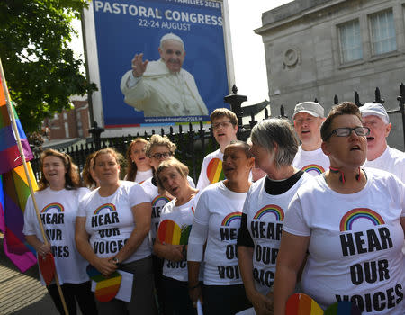 An LGBTI choir sings during a protest outside the Pastoral Congress at the World Meeting of Families in Dublin, Ireland August 23, 2018. REUTERS/Clodagh Kilcoyne