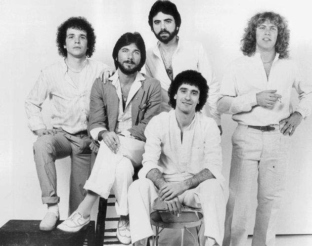 Donnie Iris, bottom front, is shown with the Ohio-based band Wild Cherry.