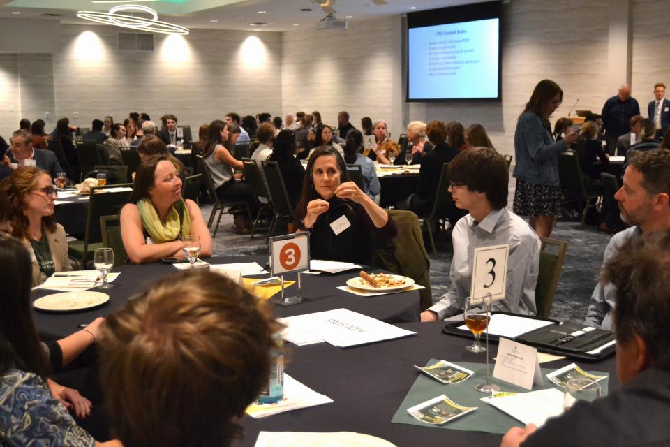 Fort Collins Mayor Jeni Arndt speaks to students at her table during the ASCSU Community Roundtable on Monday in the Never No Summer Room at Colorado State University's Lory Student Center in Fort Collins.