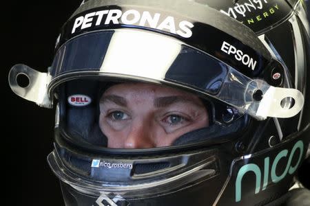 Mercedes' Nico Rosberg of Germany preparing for the first practice session. REUTERS/Adrees Latif