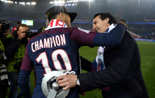 Outgoing PSG coach Unai Emery (R) with Neymar at the club's title celebrations last week