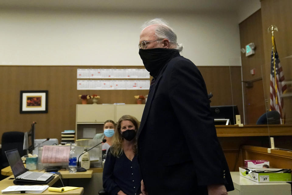 Attorney Geoffrey Carr, representing Richelle Nice, known as Juror 7 in the original Scott Peterson trial, walks to his seat during a hearing at the San Mateo County Superior Court in Redwood City, Calif., Monday, Feb. 28, 2022. (AP Photo/Jeff Chiu, Pool)