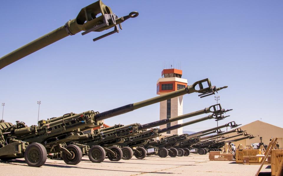 US Marine Corps M777 towed 155 mm howitzers are staged on the flight line prior to being loaded onto a US Air Force aircraft - US MARINES/REUTERS