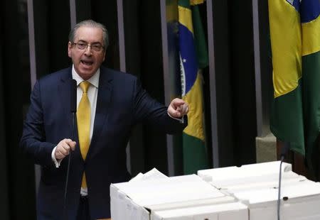 Former speaker of Brazil's Lower House of Congress, Eduardo Cunha (bottom L), speaks at a session of the House as they debate his impeachment, in Brasilia, Brazil, September 12, 2016. REUTERS/Adriano Machado