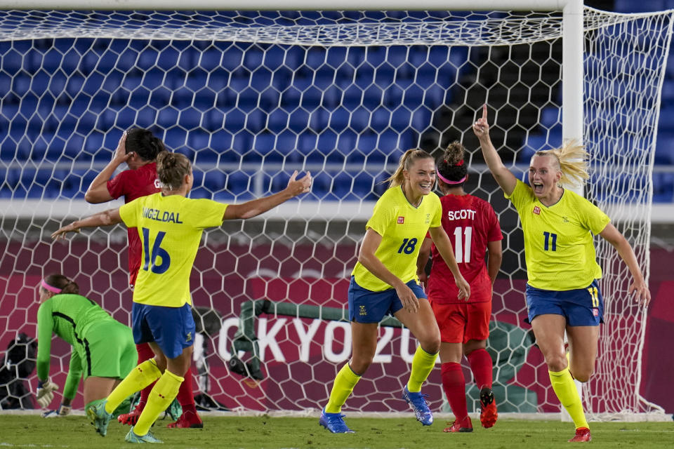 Sweden's Stina Blackstenius celebrates scoring her side's opening goal against Canada in the women's soccer match for the gold medal at the 2020 Summer Olympics, Friday, Aug. 6, 2021, in Yokohama, Japan. (AP Photo/Fernando Vergara)